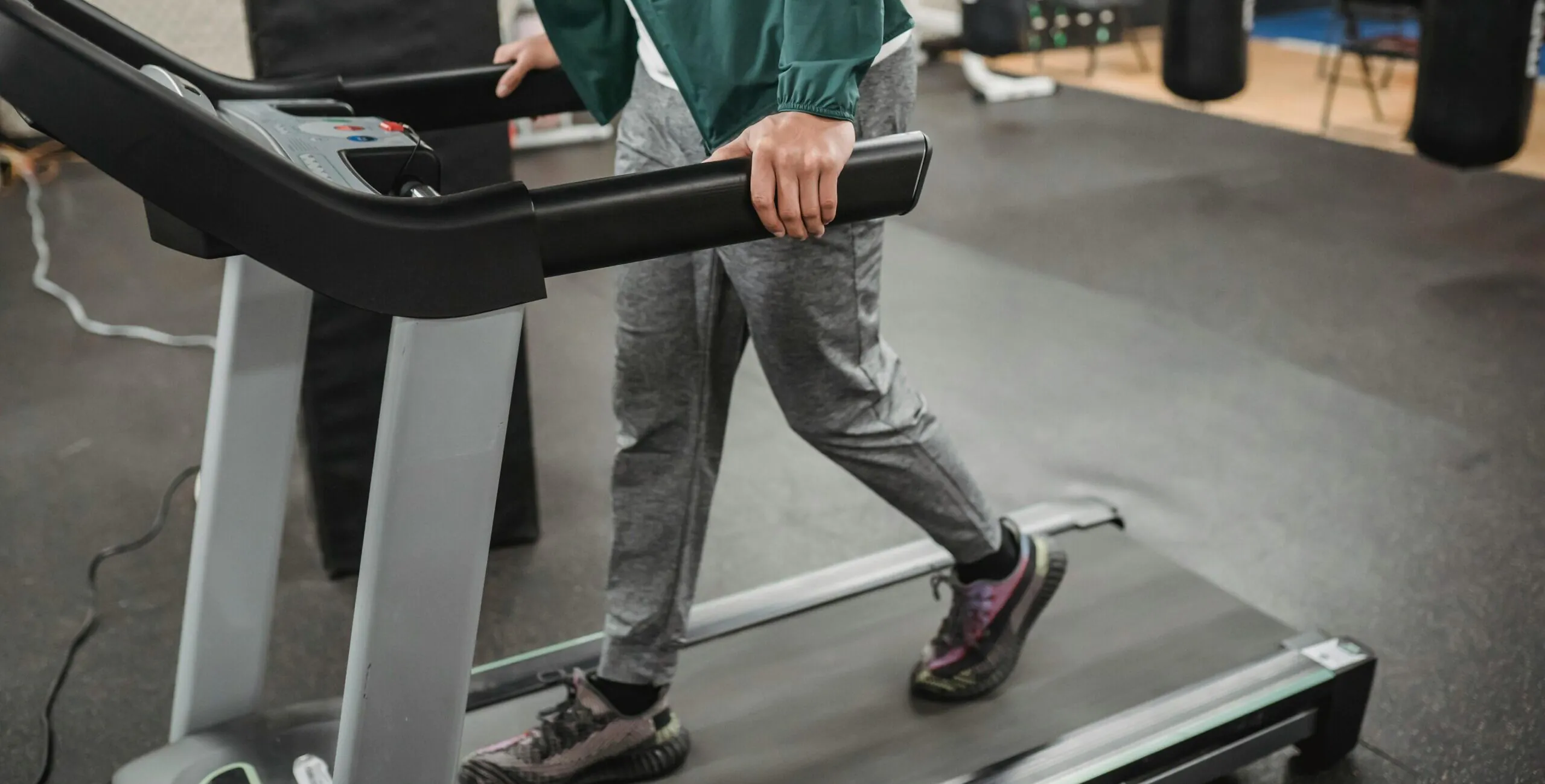 Man on a treadmill for analysis of walking gait
